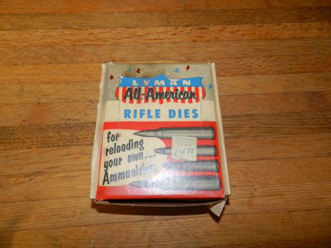 1996 Ford Bronco - A box of Lyman All-American Rifle Dies is shown, with text indicating it is for reloading ammunition.