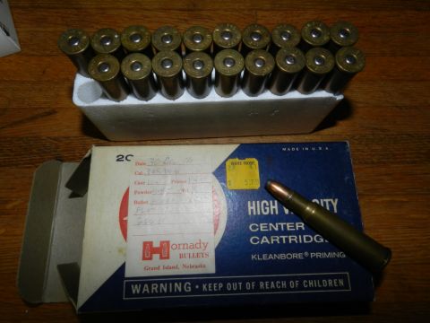 1996 Ford Bronco - A box of Hornady cartridges and loose rounds are displayed on a wooden surface.