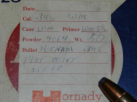1996 Ford Bronco - A close-up of a document detailing ammunition specifications, including caliber and powder weight.