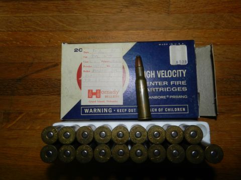 1996 Ford Bronco - A box of Hornady High Velocity center fire cartridges is shown with a single round and a tray of 20 rounds.