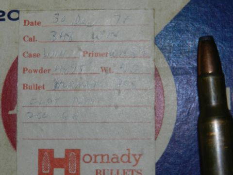 1996 Ford Bronco - Ammunition reloading data card with handwritten details and a bullet shown on the right.
