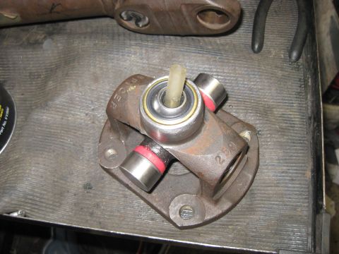 1994 Ford Bronco - Close-up of a driveshaft universal joint, likely during a rebuild process.