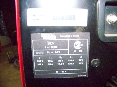 1985 Ford Bronco - This data plate details the electrical input and output for a Lincoln Electric DC welder, assembled in Mexico.