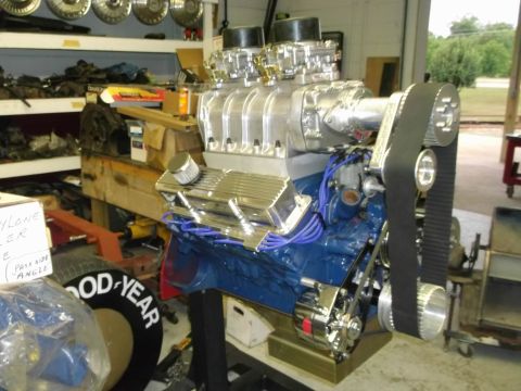 1971 Ford Ranchero - A powerful V8 engine, likely a performance upgrade, is displayed with its supercharger and dual carburetors.