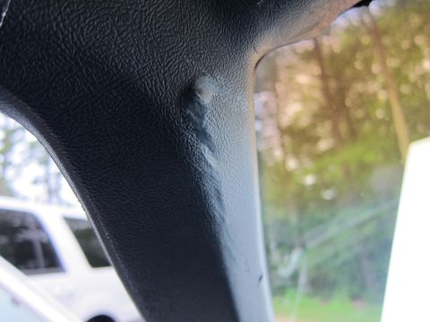 1991 Ford LTD Crown Victoria - Damage to interior trim is visible, with another vehicle seen through the window.