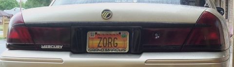 2000 Mercury Grand Marquis - The rear of a 2000 Mercury Grand Marquis is shown, its distinctive taillights and license plate.