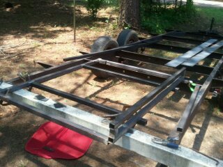 1978 Ford Bronco - This is a trailer frame, possibly under construction or repair, with metal bracing added.