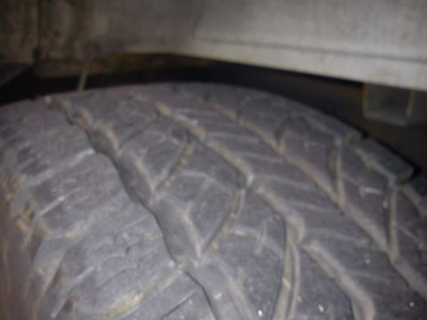 1997 Chevrolet Silverado 1500 - Tire tread detail with a watermark visible in the lower right corner.