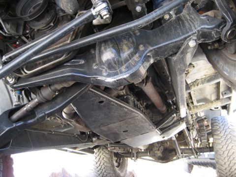 1996 Ford Bronco - This image shows the underbody of an off-road vehicle, highlighting its suspension and drivetrain components.