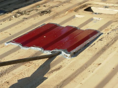1983 Ford Bronco - If the plate ever has to be removed again, remove all the screws & pry up the sealant. It's MUCH easier on a hot day, but the goo will come…