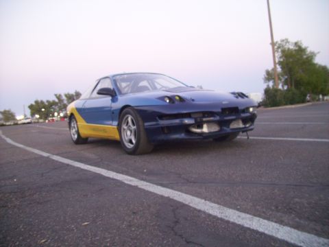 1995 Ford Probe - This 1995 Ford Probe has a custom two-tone paint job and appears to be modified for racing.