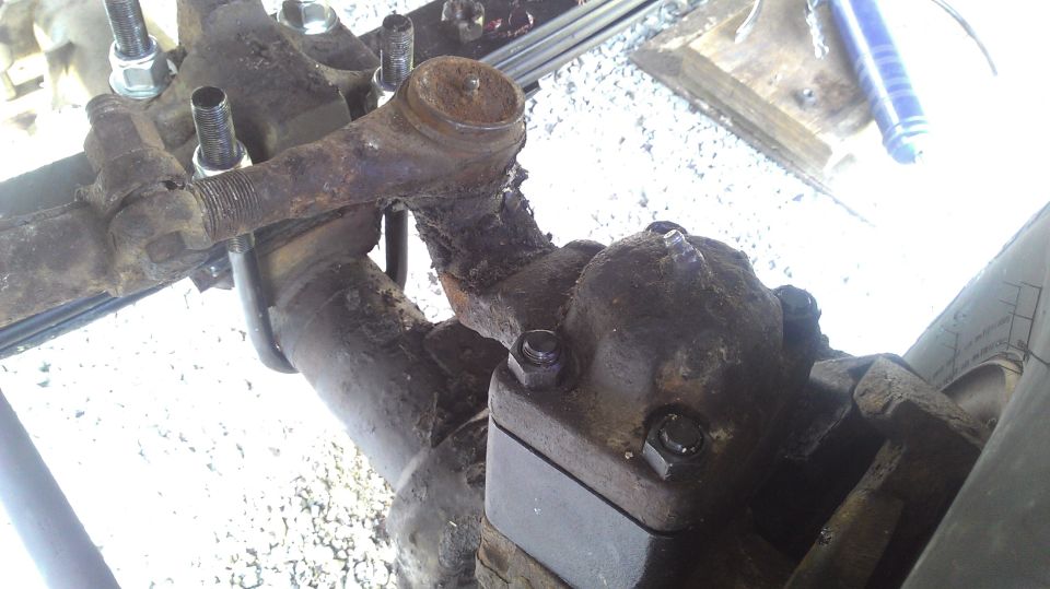 rusted steering linkage with tie rod ends and ball joints
