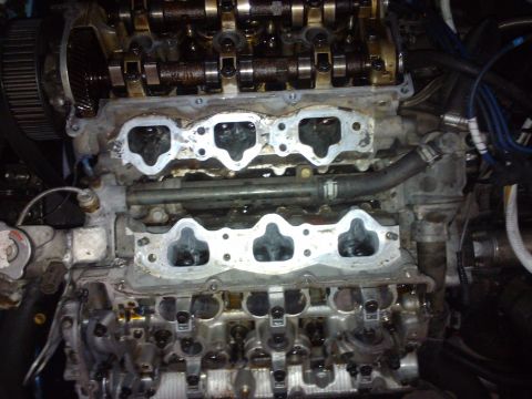 1995 Ford Probe - Close-up view of an engine's internal components, including the cylinder head and intake ports.