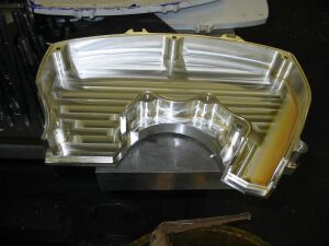 1993 Ford Taurus - Close-up of an aluminum intake manifold, likely a performance part for an engine.