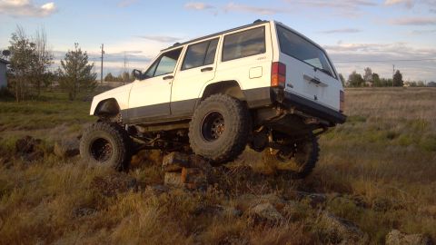 1995 Jeep Cherokee - Modified 1995 Jeep Cherokee navigating an obstacle course of rocks.