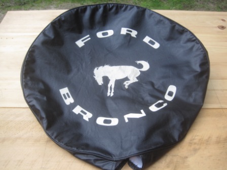 1993 Ford Bronco - Spare tire cover for a Ford Bronco with the iconic horse logo and lettering.