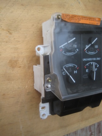 1993 Ford Bronco - This is a vehicle's instrument cluster, showing fuel level and engine temperature gauges.