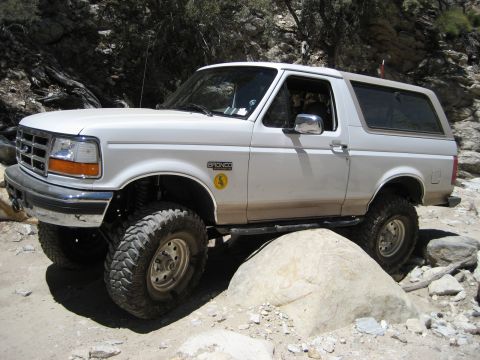 1996 Ford Bronco - This 1996 Ford Bronco is navigating a rocky off-road path.