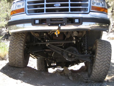 1996 Ford Bronco - Front view of a 1996 Ford Bronco showing its suspension, winch, and large tires.