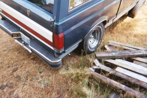 1987 Ford Bronco - bumper was on the ground.