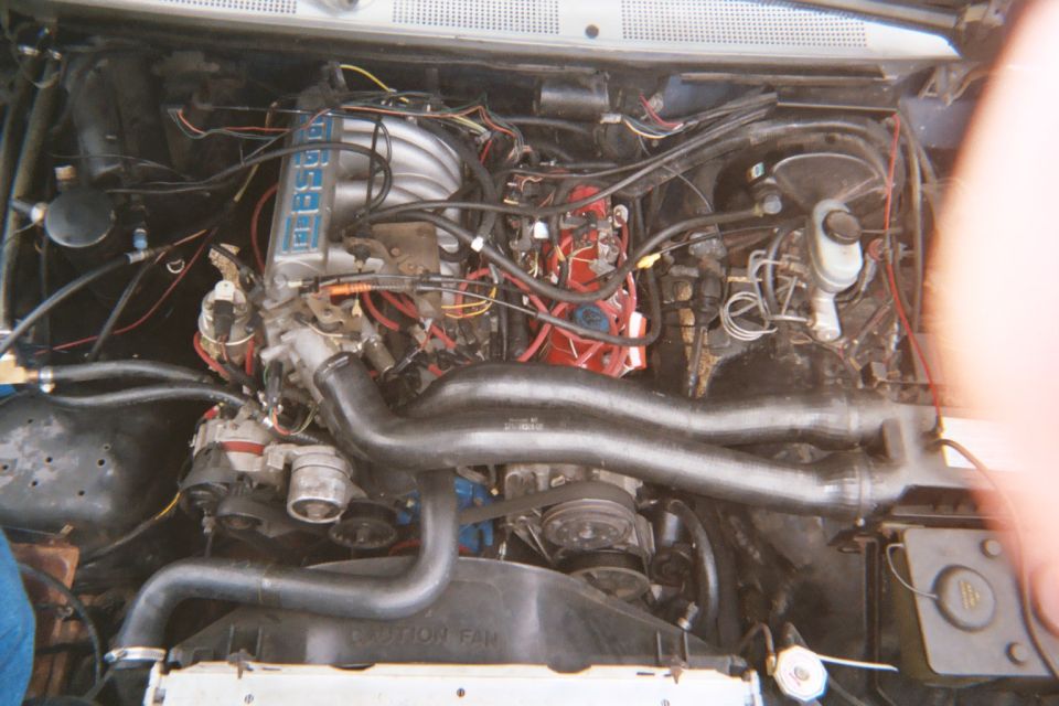 after a few hundred miles, notice how i now have the correct A/C pump and 5.8 bracket for that setup (the other setup was only being held on my the 2 bolt holes that still lined up)