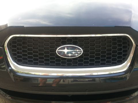 2008 Subaru Legacy - Front view of a 2008 Subaru Legacy's grille, the distinctive honeycomb pattern and emblem.