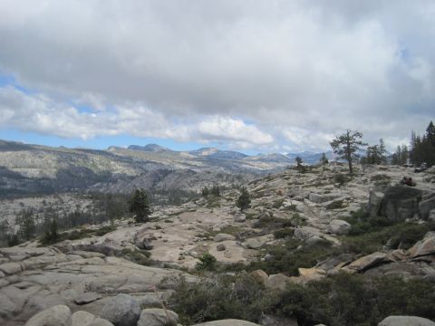 1989 Ford Bronco - Expansive view of a rocky, mountainous area under a partly cloudy sky.