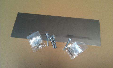 1970 Mercury Cougar - Hardware kit includes bolts and washers with a metal panel.