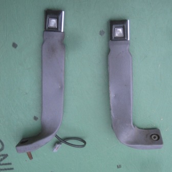 1993 Ford Bronco - Seat belt buckle receivers shown, likely for a Ford Bronco.