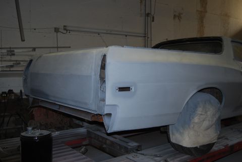 1975 Ford Ranchero - The rear of a Ford Ranchero is prepped for paint in a workshop setting.