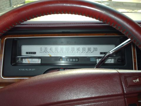 1991 Mercury Grand Marquis - Dashboard view of a 1991 Mercury Grand Marquis, the speedometer and gear indicator.