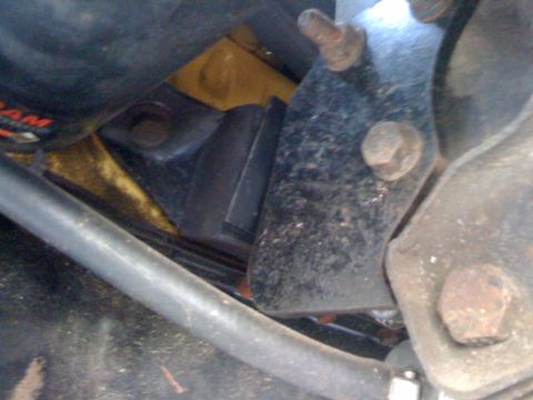 1964 Ford Ranchero - Engine mount bracket with bolts and rubber isolator visible.