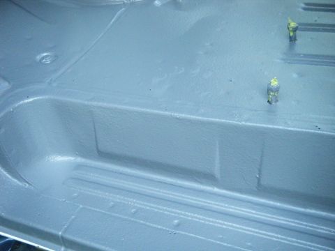 1988 Ford E350 - The interior floor of a 1988 Ford E350 van has been painted gray.