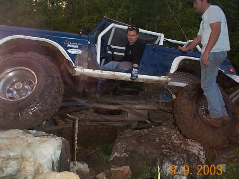 1977 Ford Bronco - This 1977 Ford Bronco is navigating a difficult off-road obstacle course.