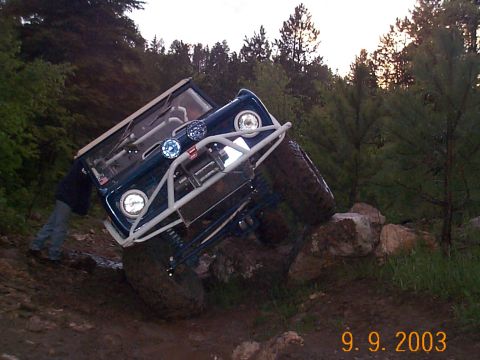 1977 Ford Bronco - This 1977 Ford Bronco is shown off-roading on a challenging rocky trail.