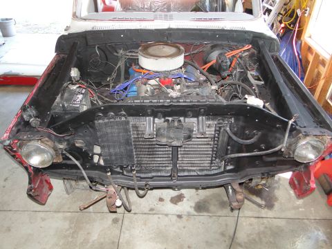 1978 Ford Bronco - Front view of a 1978 Ford Bronco's engine bay during a tare down.