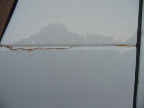 1992 Ford Bronco - b-pillar seam..you can see rust forming in the crack