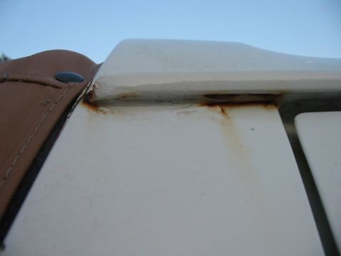 1992 Ford Bronco - PS - underneath the rain gutter. this is obviously rusted through.