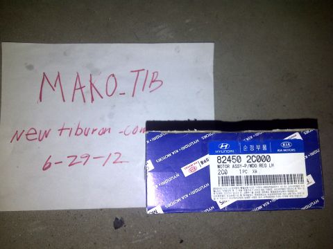 2003 Hyundai Tiburon - A box for a motor assembly part is shown next to handwritten notes on paper.
