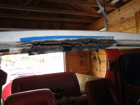 1978 Ford Bronco - The vehicle's roof panel shows significant rust damage and has been taped off.