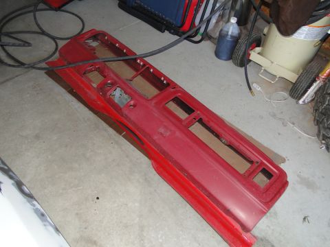 1978 Ford Bronco - A red dashboard panel is shown disassembled, likely for restoration or repair.