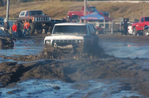 1978 Ford Bronco - Mud bogging event features a 1978 Ford Bronco navigating a difficult course.