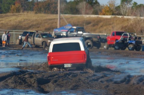 1978 Ford Bronco - Mud bogging event with a 1978 Ford Bronco struggling in the mire.
