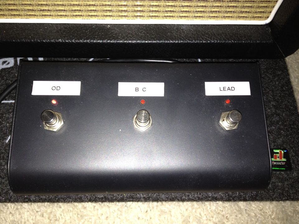 Black foot switch pedal with three buttons labeled OD, BC, and LEAD, each with a red indicator light