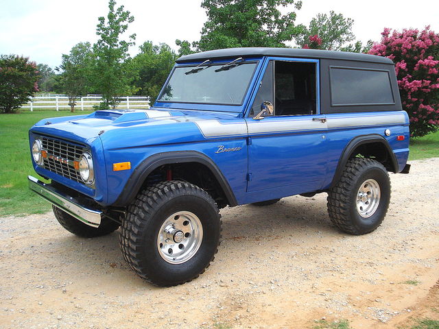 Blue 1978 Ford Bronco 3/4 front view with silver stripe