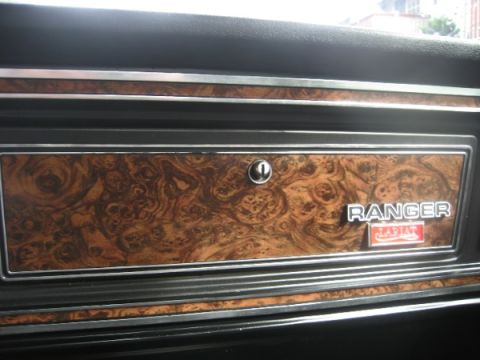 1979 Ford F-350 - The interior trim features a wood grain pattern and a RANGER LARIAT badge.