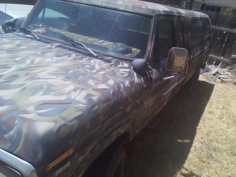 1979 Ford F-350 with camouflage paint, front quarter view
