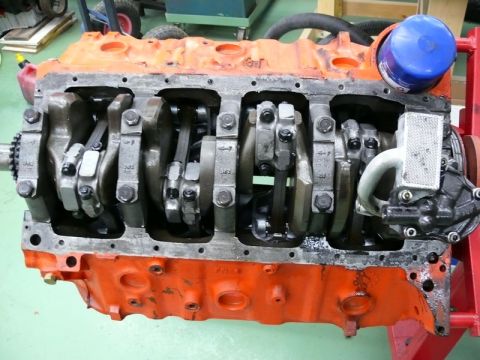 1968 Chevrolet Camaro - Close-up view of an engine block's internal components, including the crankshaft and connecting rods.