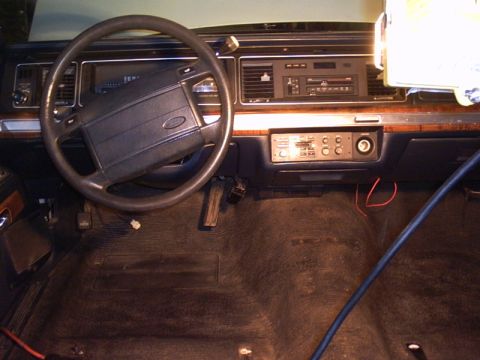 1991 Ford LTD Crown Victoria - Interior view of a 1991 Ford Crown Victoria, showing the dashboard, steering wheel, and center console.