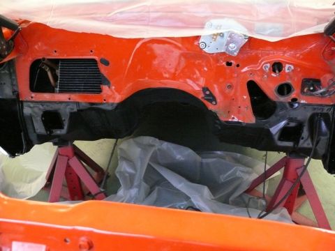 1968 Chevrolet Camaro - The engine bay firewall of a 1968 Chevrolet Camaro, showing the radiator and surrounding components.